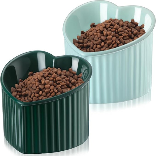 Mumufy 2 Pcs Ceramic Elevated Cat Bowls Tilted Elevated Raised Pet Bowls Anti Vomit Cat Dish for Indoor Stress Free Water Dish Feeder for Puppies, Heart Shaped(Macaron Blue, Peacock Green)